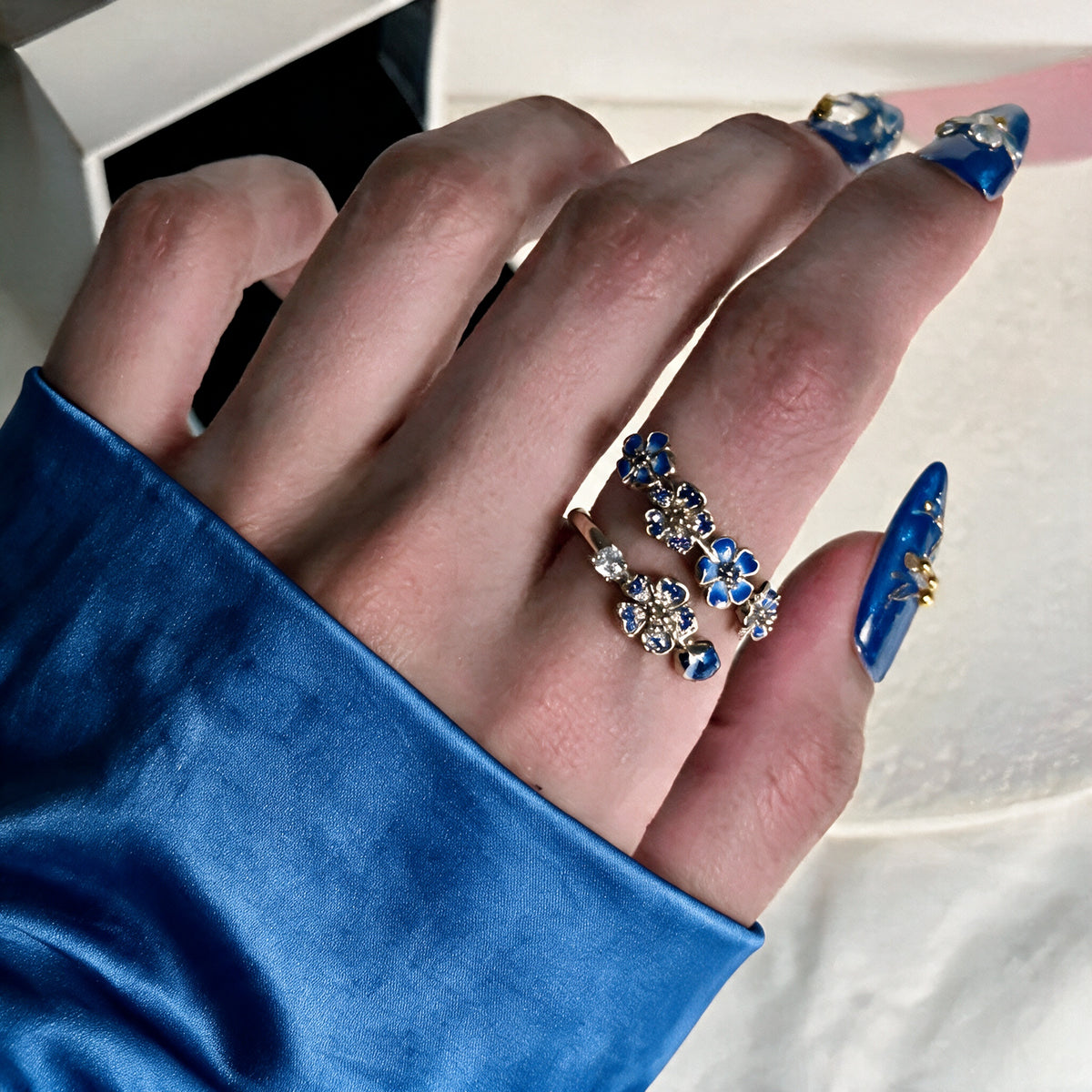 Sakura Cherry Blossom Adjustable Ring - Blue / Silver worn on hand
